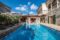 Eindrucksvolle charmante Villa im Herzen von Es Capdellà - Poolbereich und Terrasse mit Außenküche im Hintergrund