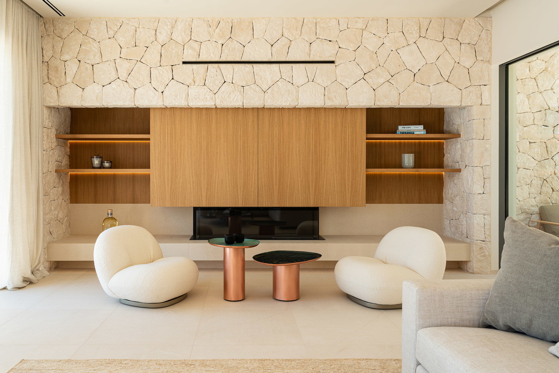 Premium Villa mit atemberaubendem Meerblick - Wohnbereich mit Kamin
