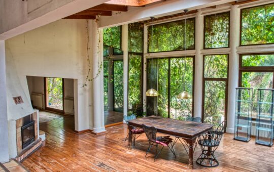 INVESTMENT: Natural stone finca in the Sa Coma Fría valley, Andratx - Dining area with fireplace
