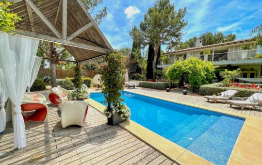 Modern villa with garden and pool in Sol de Mallorca - Pool with small pergola