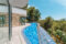 Moderne exklusive Neubau Villa - Rückfassade mit Terrasse und Pool
